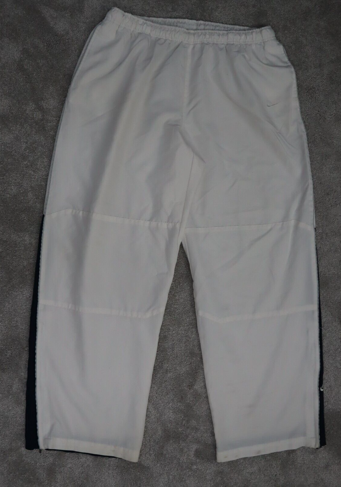 Nike cream track online pants