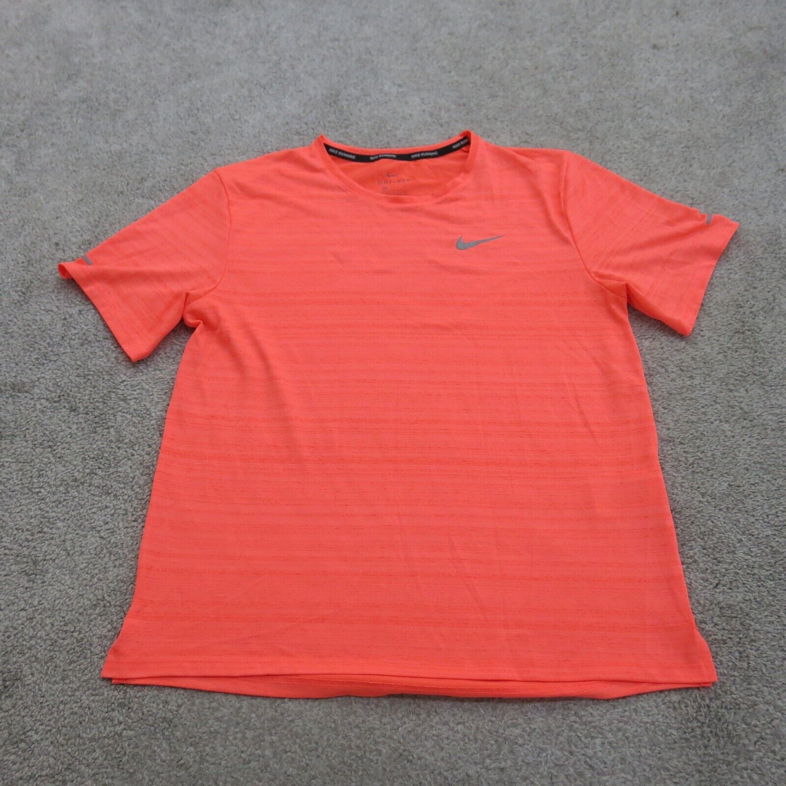 pink and green nike shirt