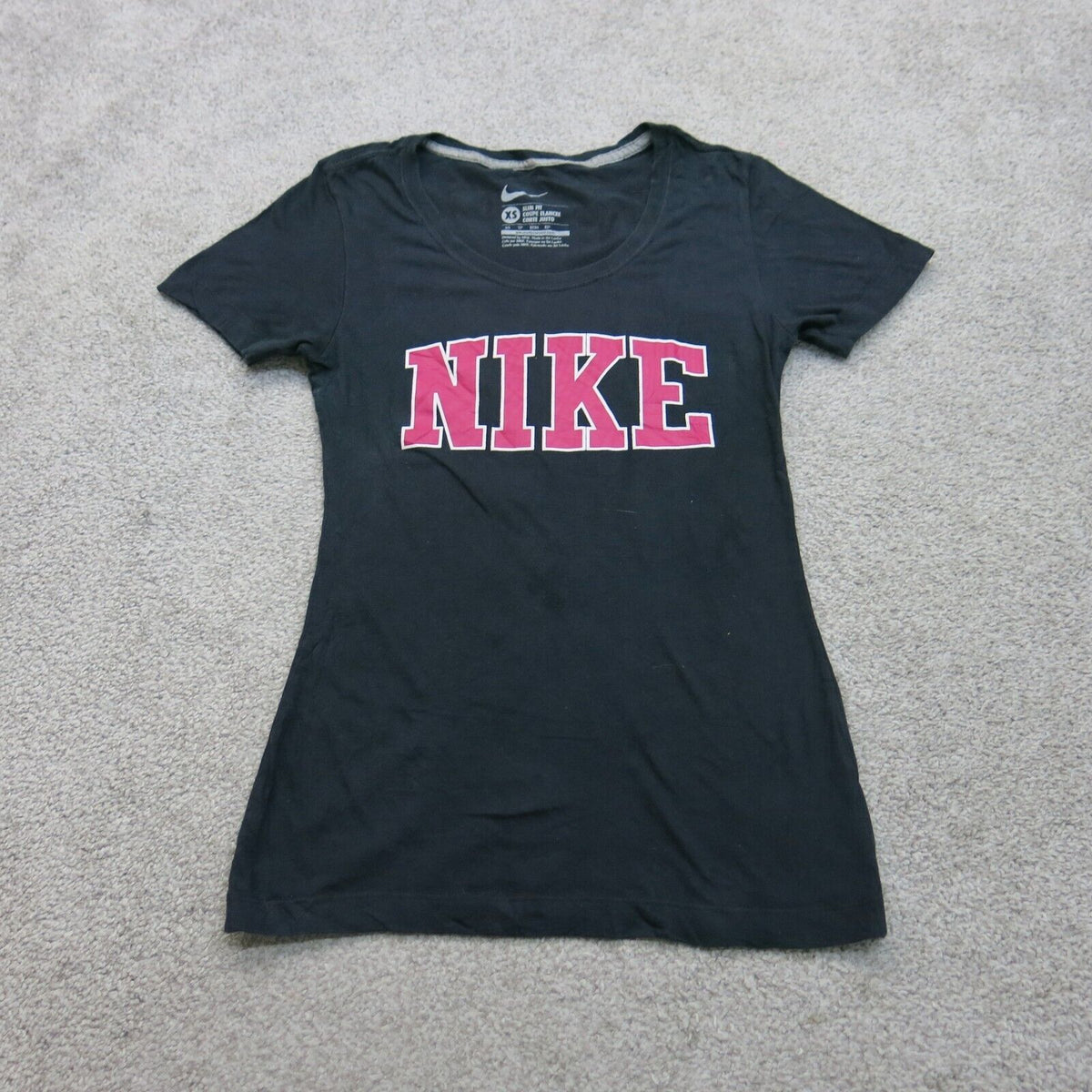 Pink black nike sales shirt