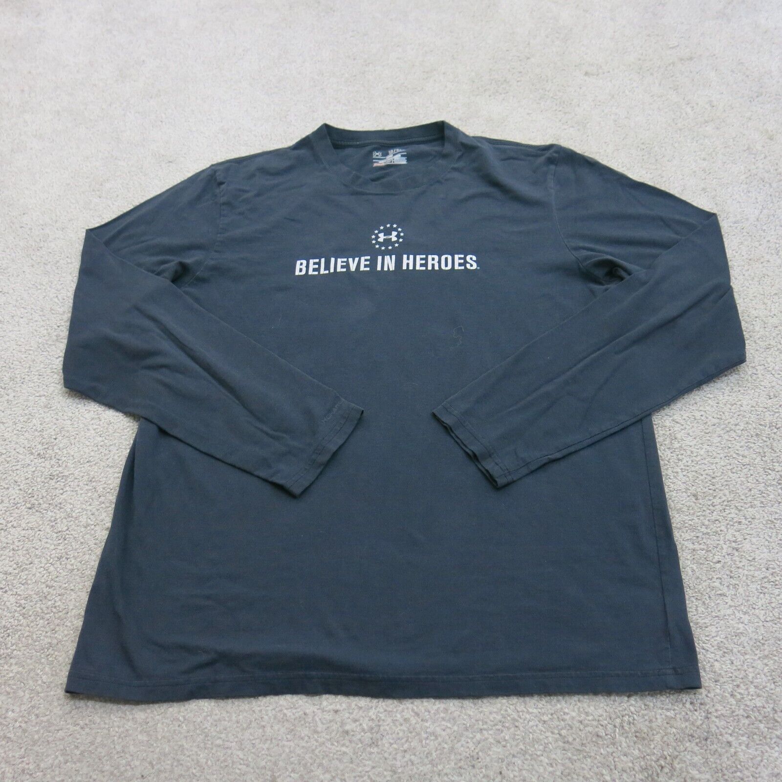 Under armour believe shop in heroes shirt