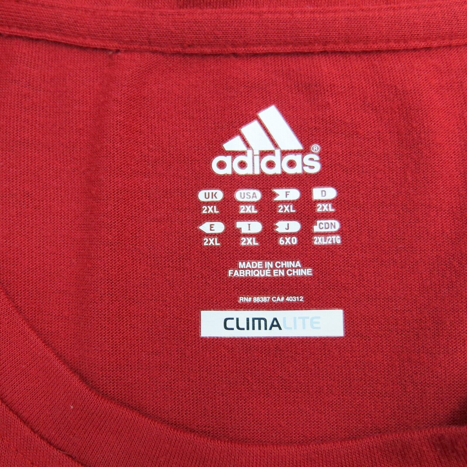 Adidas rn 88387 ca 40312 store t shirt